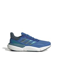 Blå och mörk teal atletisk sneaker med vit dämpad sula och teal Adidas-stripes på sidan, visad i profil mot vit bakgrund.