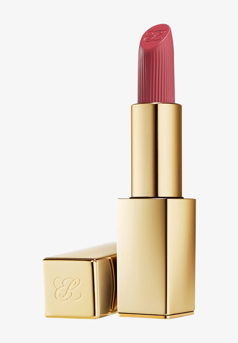 Rossetto di tonalità rosa con texture rigata, contenuto in una custodia rettangolare dorata con cappuccio abbinato posizionato accanto.