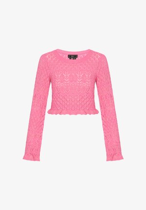 Pull en maille crochet de couleur rose vif, avec des manches longues et un ourlet festonné. Le motif ajouré crée un design texturé et aérien.
