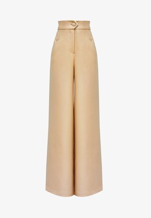 Beżowe spodnie szerokie w nogawkach z wysokim stanem, zapinane na guziki, z dwoma przednimi kieszeniami. Gładki materiał o dopasowanym kroju.