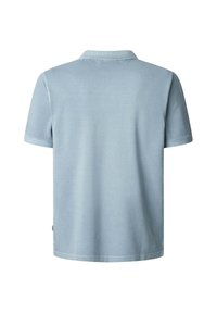 Light blue polo shirt with short sleeves, made from smooth cotton fabric. Features a classic collar and a small side tag.