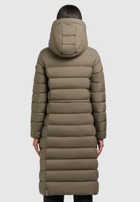 Long, olive green puffer coat with a hood, featuring horizontal quilted segments and elastic cuffs. Back view highlights the length and texture.