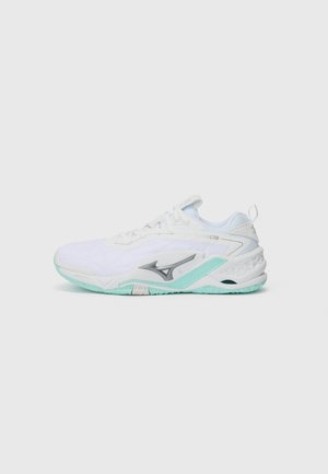 White athletic shoe with a textured upper, turquoise accents, and a rubber sole. Features laces and a logo on the side.