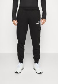 Puma - CARGO PANTS - Treniņtērpa apakšdaļas - schwarz Miniatūras attēls 1