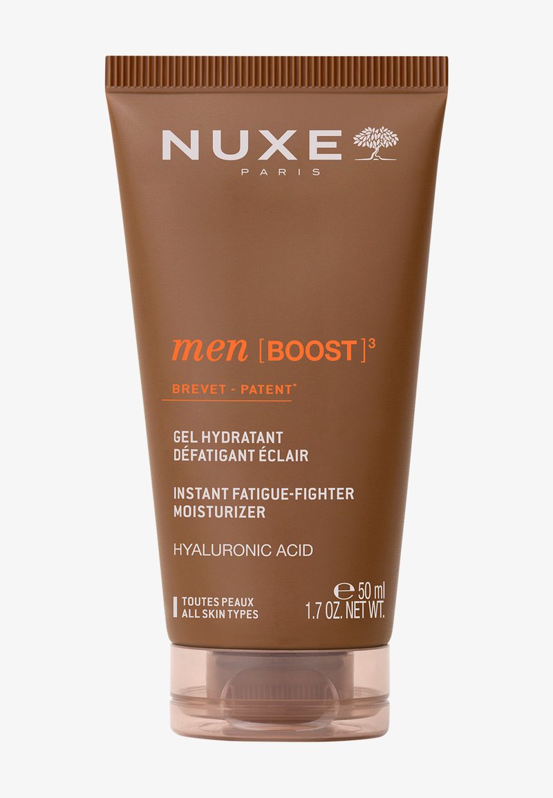 Bruine knijptube met een gestructureerde dop. Beschikt over witte en oranje tekst. Het product is een hydraterende gel met hyaluronzuur, 50 ml.