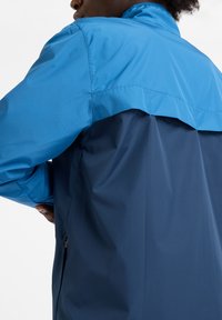 New Balance RUN JACKET - Windbreaker - blue
