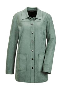 Groene suedjasje met een kraag, knoopsluiting aan de voorkant, twee achterzakken en lange mouwen met een ontspannen pasvorm.