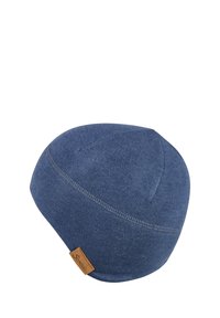 Dark blue beanie hat made of soft fabric, featuring a rounded top, subtle stitching details, and a small brown leather tag at the hem.
