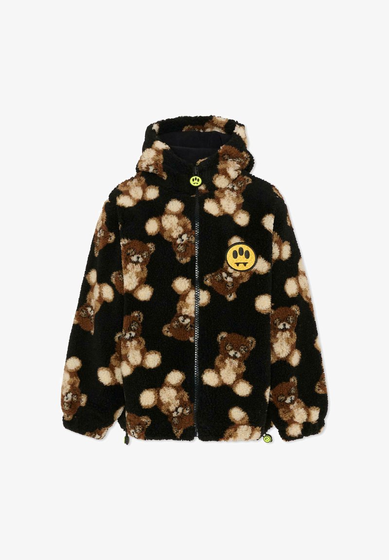Veste en polaire noire avec un motif d'ours en peluche marron et crème. Comprend une capuche, une fermeture éclair et un patch en forme de visage sourire jaune.