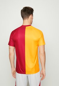 Nike Performance GALATASARAY ISTANBUL FOOTBALL HOME - T-shirt de sport - orange