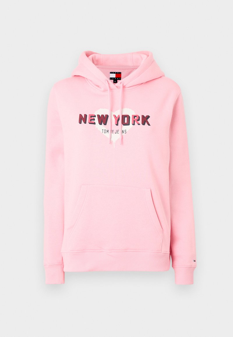Felpa rosa chiaro in cotone, con la scritta "NEW YORK" in grassetto e grafiche di cuori. Include una tasca frontale e cappuccio con lacci.