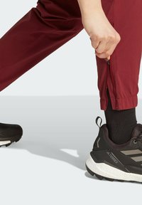 Adidas Terrex UTILITAS - Outdoor trousers - shadow red