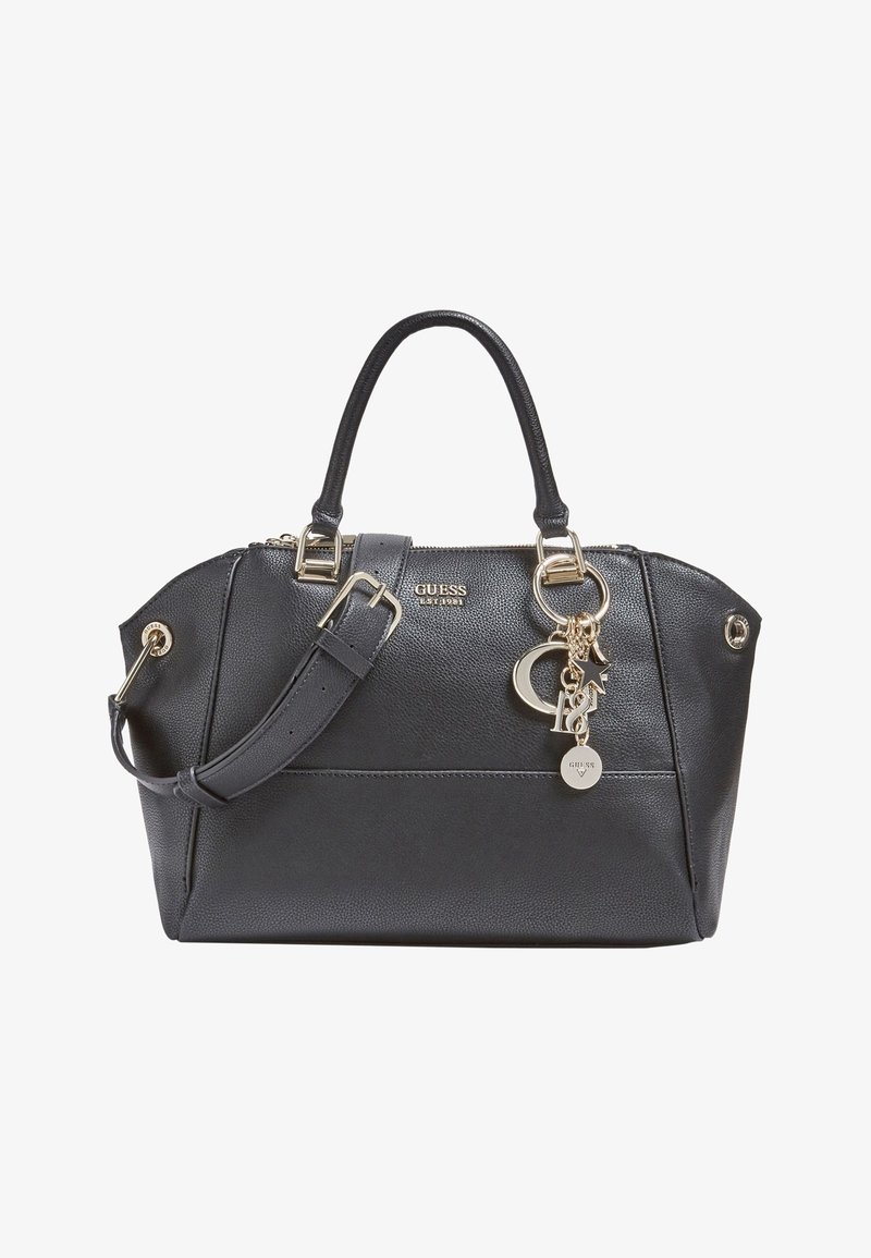 Sac à main Guess noir avec doubles anses, bandoulière réglable, logo doré, et détails de breloques en forme d'étoile, croissant et rond.