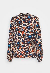 Halenka s dlouhým rukávem a vysokým výstřihem, s béžovým základem a živým abstraktním květinovým vzorem v červených, modrých a hnědých odstínech.