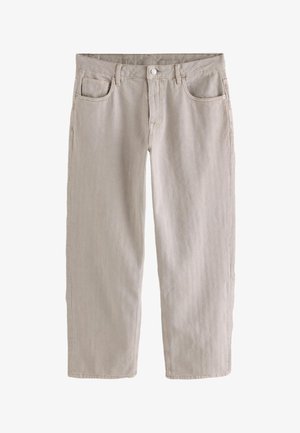 Jean beige à jambes larges en tissu texturé, avec une fermeture à bouton, cinq poches et de fines rayures verticales.