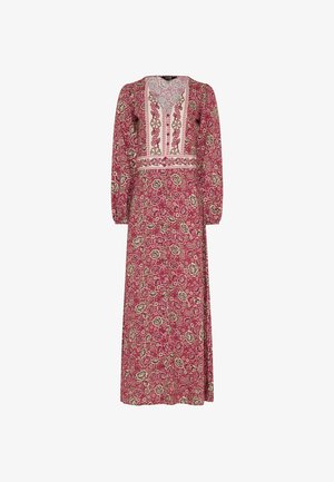 Pitkähihainen, nilkkapituinen vaaleanpunainen mekko, jossa on kukkakuosi ja kirjailtu V-kauluspaneeli sekä vyötärön yksityiskohta.