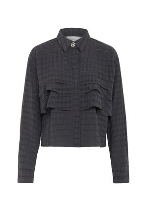Gray cropped button-up shirt features a textured fabric, front ruffles, and a rounded collar with a decorative button detail.