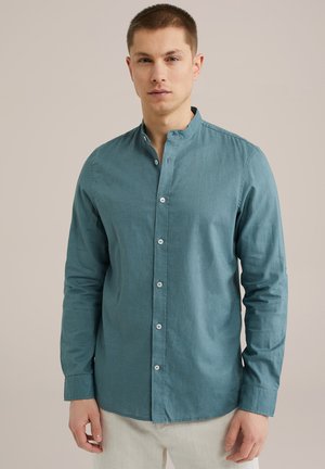 Teal long-sleeve shirt with a band collar, front buttons, and a smooth texture. Features tailored fit with minimalistic design details.