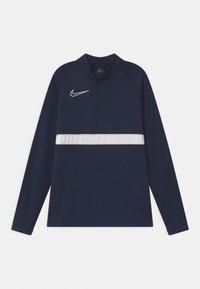 Sudadera atlética de manga larga en azul marino con medio zipper, banda horizontal blanca en el pecho y logo de Nike en blanco en el lado izquierdo.