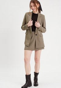 Cache Cache Top - noir