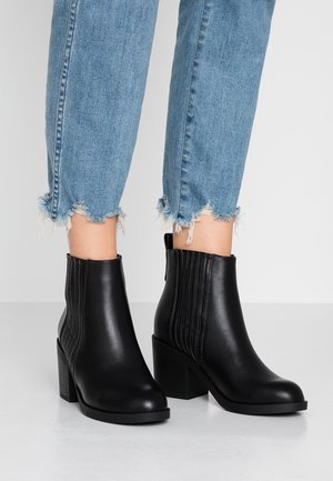 Enkelkaarsjes - black