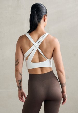 Reebok LUX  - Keskmiselt toetav spordirinnahoidja - chalk