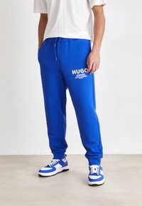 HUGO Träningsbyxor - blue