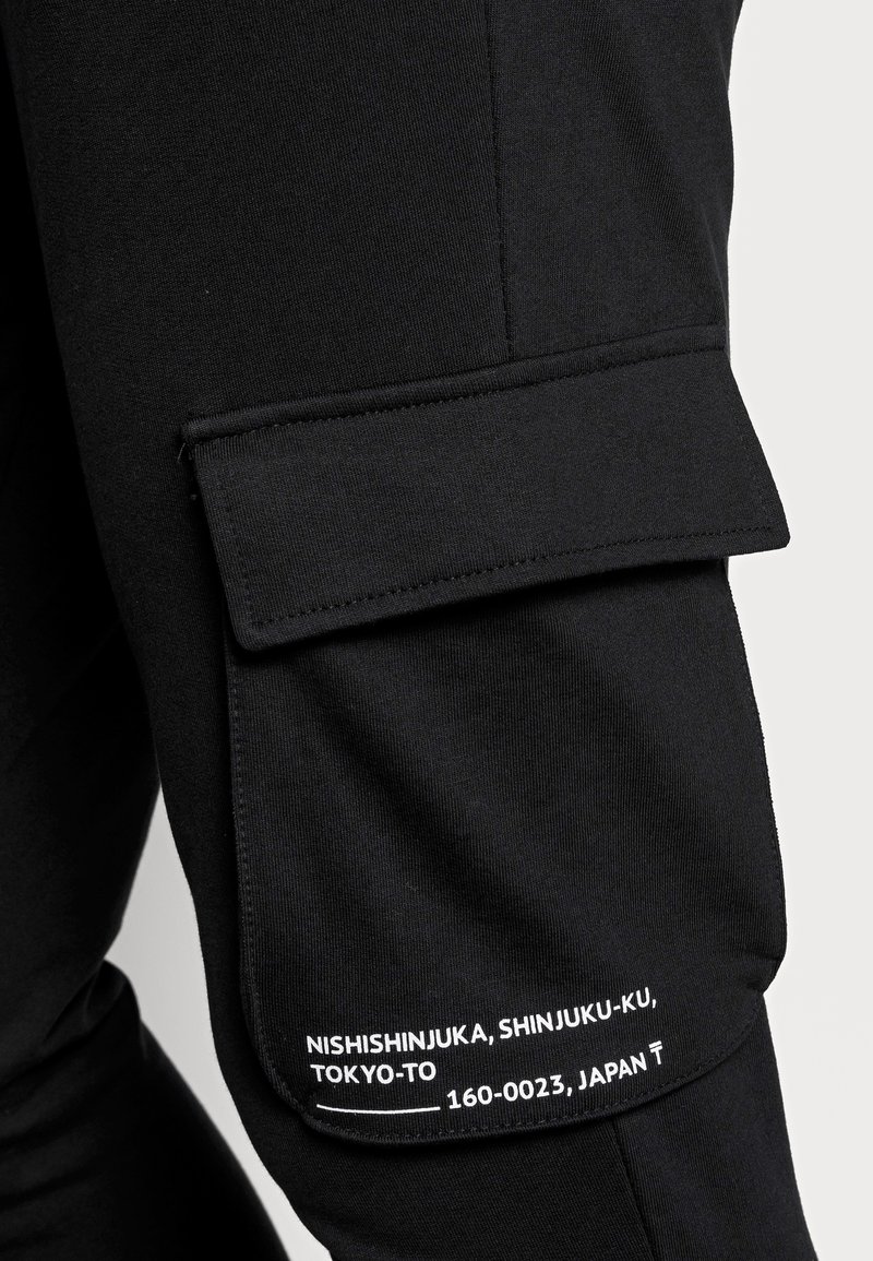 Herren Trainingsanzüge | Only & Sons ONSWF KENDRICK Jogginghose black/schwarz - GR01511 Herren Trainingsanzüge | Only & Sons ONSWF KENDRICK Jogginghose black/schwarz - GR01511