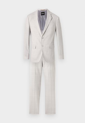 Completo beige chiaro a due pezzi con motivo a quadretti sottile, blazer con revers a lancia e due bottoni, pantaloni slim fit coordinati.