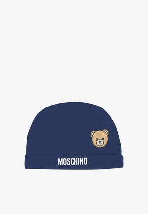 Berretto in maglia blu navy con design di un volto di orso in beige e nero. "Moschino" è stampato in bianco sul risvolto anteriore. Texture morbida.