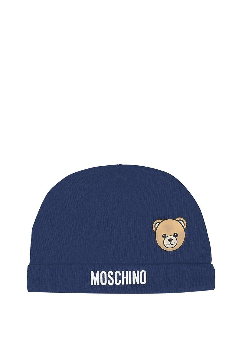 Berretto in maglia blu navy con design di un volto di orso in beige e nero. "Moschino" è stampato in bianco sul risvolto anteriore. Texture morbida.
