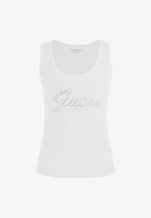 White ribbed tank top featuring the "Guess" logo embellished with rhinestones across the front. Sleeveless with a round neckline.