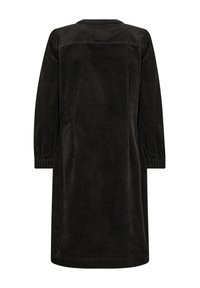 Robe en velours côtelé noir à manches longues, col rond, et poignets élastiqués, présentant un motif côtelé vertical texturé.