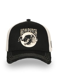 Casquette trucker noire et beige avec un dos en mesh, arborant le texte "Von Dutch" et un graphique stylisé de loup sur le panneau avant.