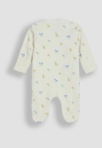 Grenouillère en coton blanche à manches longues, ornée d'un motif floral avec des fleurs bleues et jaunes. Comprend un design à pieds et des manches avec poignets.