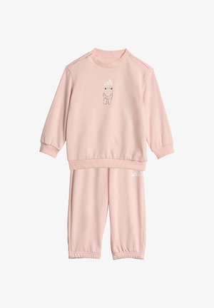Chándal de dos piezas rosa hecho de un tejido suave; cuenta con mangas largas, puños elásticos y un pequeño diseño impreso en la parte superior.