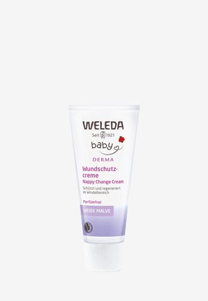 Crème de Change Weleda dans un tube blanc compressible avec une étiquette violette. Présente le nom du produit et les détails clés en allemand et en anglais.