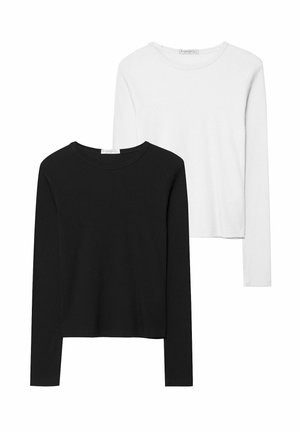 Musta ja valkoinen pitkähihainen t-paita, jossa on pyöreät kaula-aukot, pehmeä kangas ja vartalonmyötäinen muotoilu suorin helmoin.