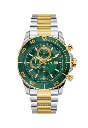 Grøn rustfri ståluge med gyldne accenter, kronograf-urskiver, ensretret drejekrans og et tofarvet armbånd med sølv- og guldlænker.