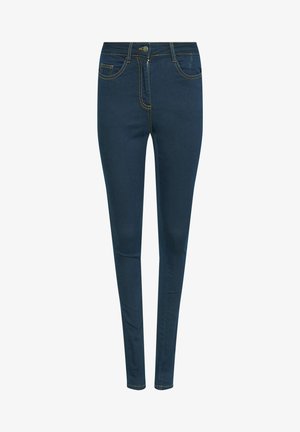 Jeans slim fit in denim blu scuro con cuciture gialle a contrasto, design a cinque tasche, chiusura con zip e bottone.