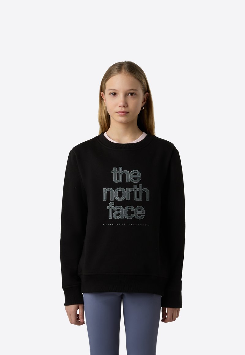 Μαύρο φούτερ από μαλακό ύφασμα με μεγάλο λογότυπο "the north face" σε ανοιχτό γαλάζιο και τη φράση "NEVER STOP EXPLORING" στο κάτω μέρος.