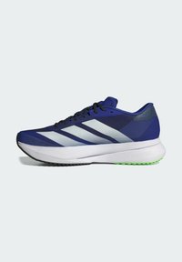 Running shoe with a blue synthetic upper, featuring three white stripes, black laces, and a green accent on the outsole. Lightweight design.