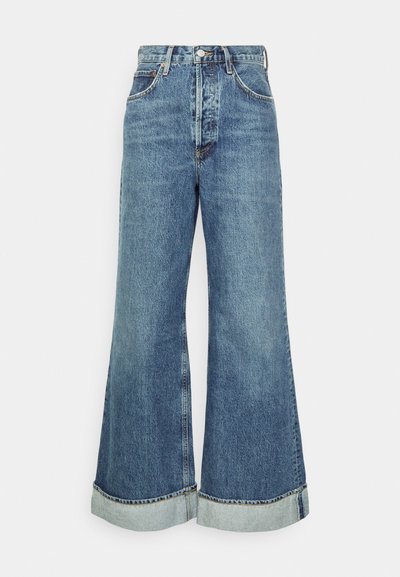 Denim wide-leg jeans in light blue with a high waist and contrast stitching. Cuffed hem adds detail. Classic pocket design on the front.