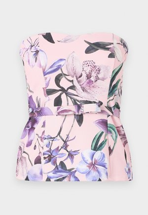 Top rose bustier avec imprimé floral violet et blanc, doté d'une taille cintrée et d'un détail ceinture en tissu.