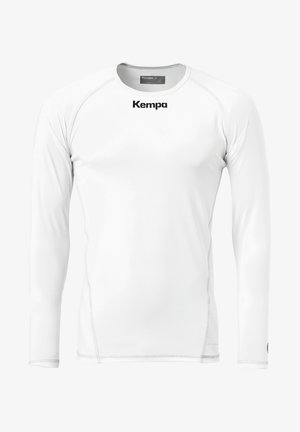 T-shirt de sport à manches longues en blanc, avec un col rond, des coutures à plat et un logo "Kempa" noir à l'avant. Tissu lisse et extensible.