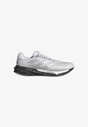 White athletic shoe with a breathable mesh upper, silver accents, and a textured black sole, featuring a cushioned, curved design.