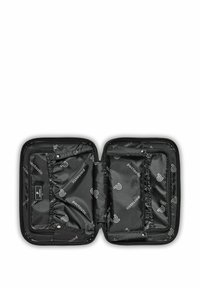 Organizzatore da viaggio nero aperto con numerose tasche con zip ed elastiche, foderato internamente con il marchio "pactastic".