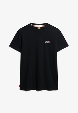 Camiseta de algodón negra con cuello redondo, mangas cortas y un pequeño logo bordado en el lado izquierdo del pecho. Etiqueta en el lado izquierdo.