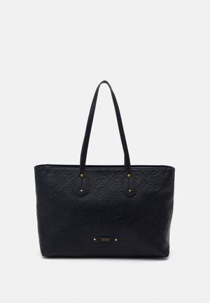 Borsa tote nera realizzata in materiale testurizzato con motivo in rilievo, doppi manici a spalla e dettagli in metallo dorato.