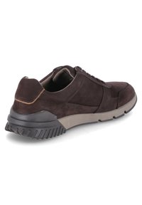 Brown suede sneaker with a rubber sole, rounded toe, and contrasting gray accents. Features lace-up design and padded collar.